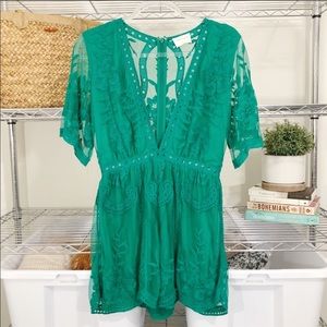 Vestique green lace overlay romper